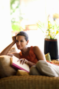 Woman reading after receiving an eye exam