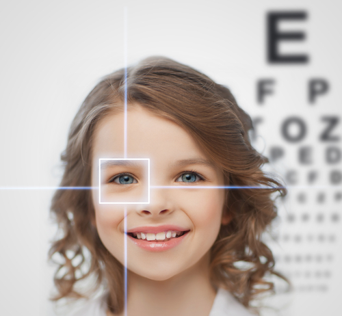 Portrait of a child against a sight test.